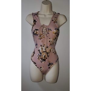 Women's sleeveless floral print bodysuit